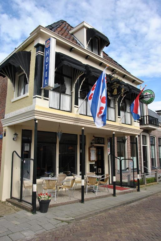 De Gouden Klok Hotell Leeuwarden Rom bilde