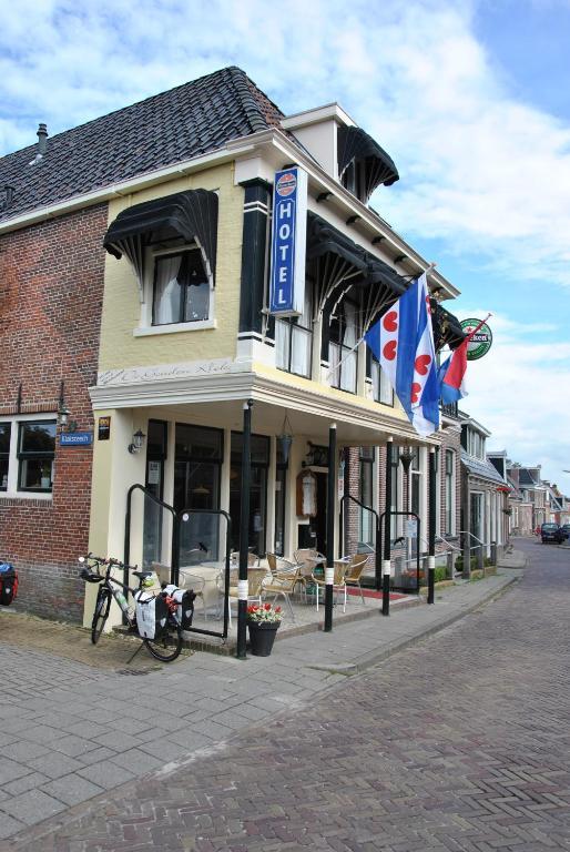 De Gouden Klok Hotell Leeuwarden Rom bilde
