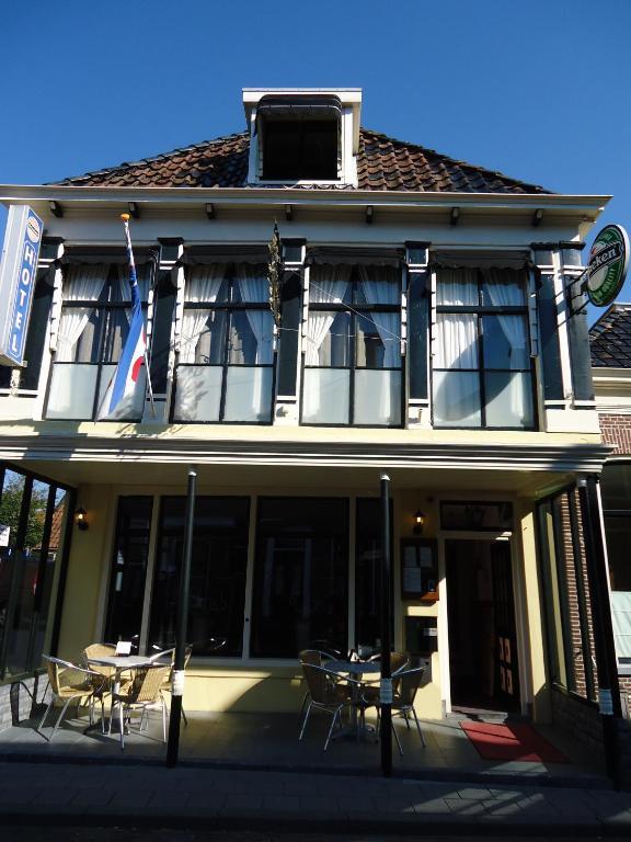 De Gouden Klok Hotell Leeuwarden Rom bilde